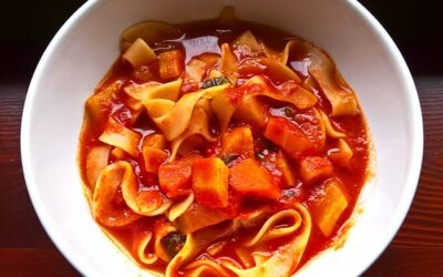 Tomato soup with wide strip noodles
