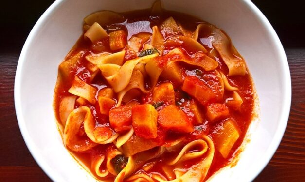 Tomato soup with wide strip noodles